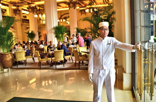 A fancy doorman at High Tea at Peninsula Hotel