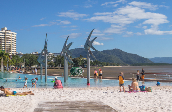 Children play in the lagoon at Cairns Esplanade.