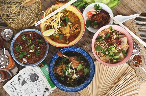 Flat lay image of a selection of noodle bowls from Chef Angus An's Fat Mao Restaurant.