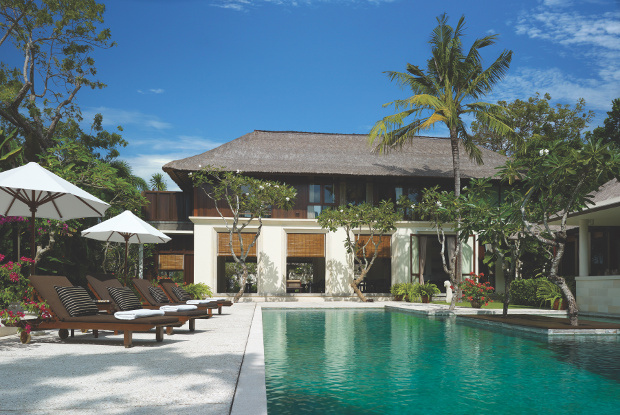 A view of the facade of one of the Four Seasons's villas and pool area