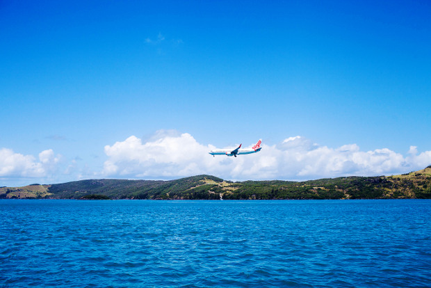 A plane arrives at Hamilton Island.